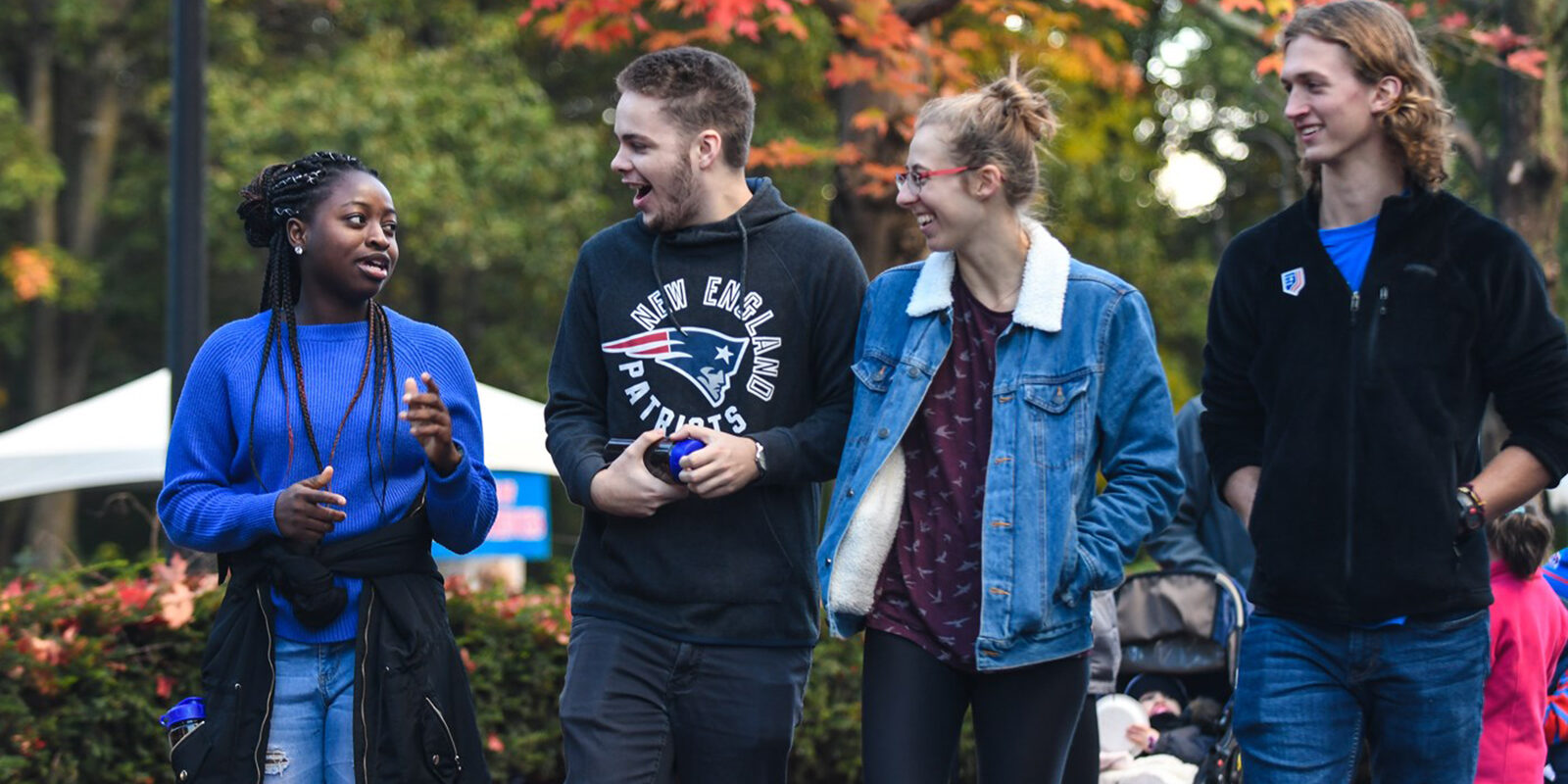 Students walking, Fall day.